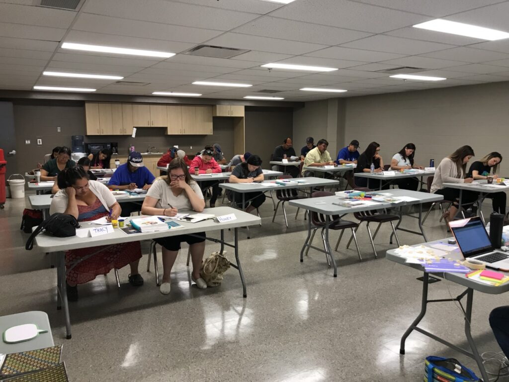 Participants read, write and learn in the boardroom.