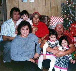 Jonas often committed much of his time towards youth and recreation in the community. Picture of him, his folks, his wife and children.